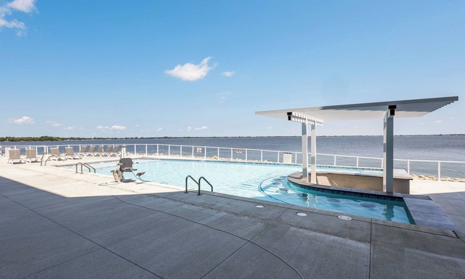 Watertown Condo | Luxury Lakefront Condo w/Private Hot Tub & Sauna