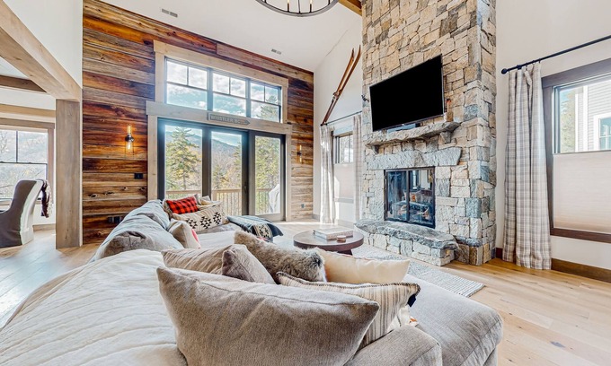 Bolingbrook Condo | Luxury mountain home with fireplace, children's items, & expansive outdoor space
