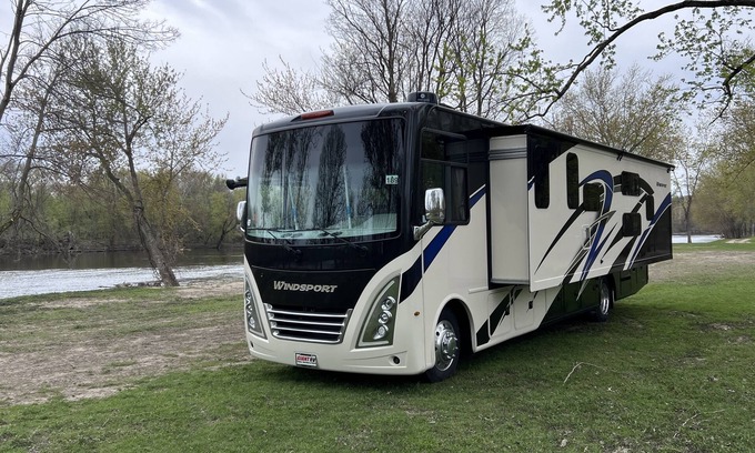 Walker House | Luxury RV with Bunkbeds Stationed near a Serene River
