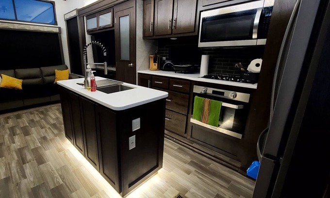Eagle Pass House | Luxury RV with full kitchen sleeps family of 6 inside fenced property