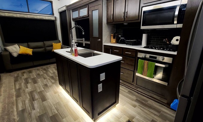 Eagle Pass House | Luxury RV with full kitchen sleeps family of 6 inside fenced property