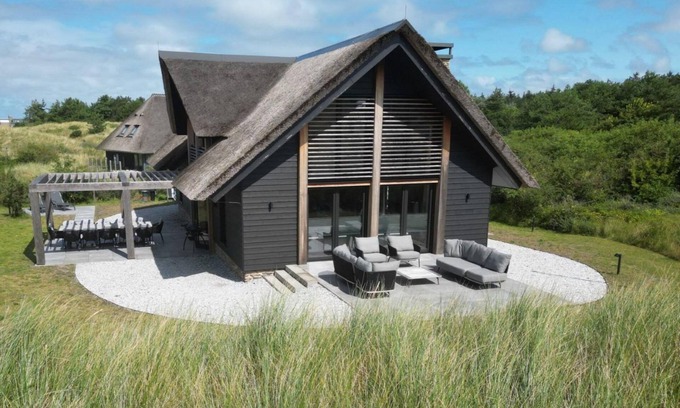 Nes Villa | Luxury villa Sig Ward with pool, sauna, spacious living room and beach 1 km away