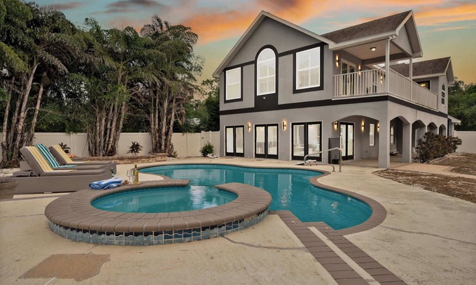 Clair-Mel City House | Luxury Villa| Waterfront + Heated Pool & Game Room