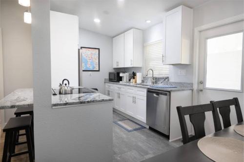 Temple Crest House | Main Attraction is a Renovated 3 BR Pet Friendly Home with Fenced Yard just Minutes Away From Busch Gardens & USF