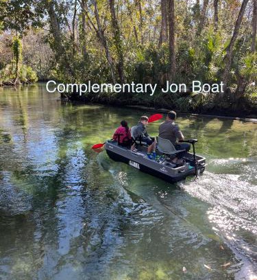 Weeki Wachee Gardens Villa | Main River Retreat hot tub, canoe with trolling motor