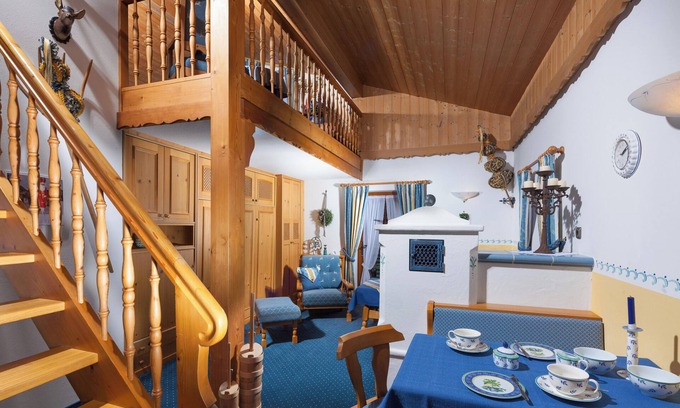 Oberschonau Apartment | Maisonette apartment Grünstein, 1-2 persons, 60 sqm, 1 bedroom, living room with tiled stove, balcony