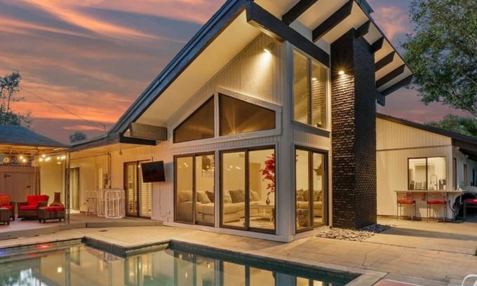 Irving House | Majestic 4BR/2.5B Home with Mini Golf, Pool, & Billiards