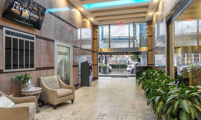Central Business District Hotel | Mardi Gras Suites NOLA's 4BR Elegance