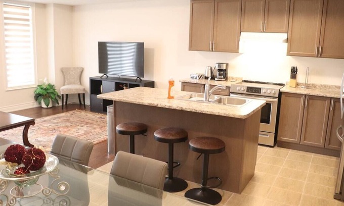 Markham House | Markham home near Toronto with dual patios, bright
