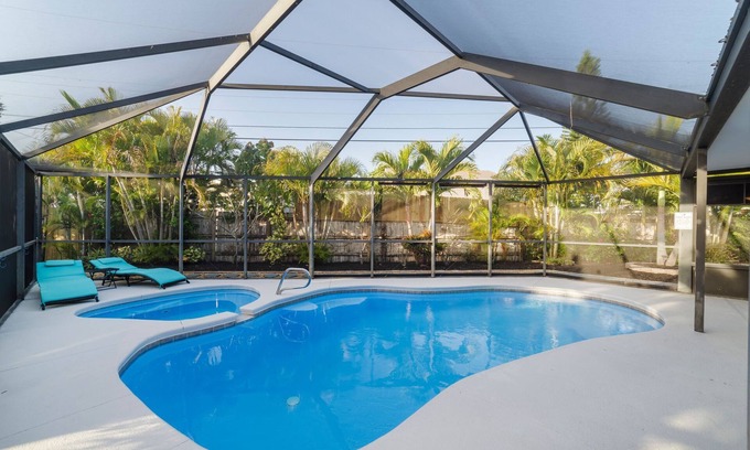 Hampton Homes House | Marlin on Merritt Pool House featuring Private Game Room, Mini Golf & Fire Pit!