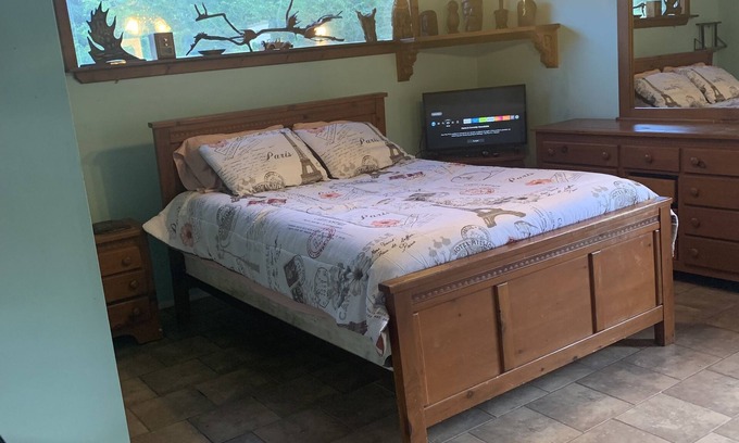 Northwest Pensacola House | Master Bedroom at Rainbow's End