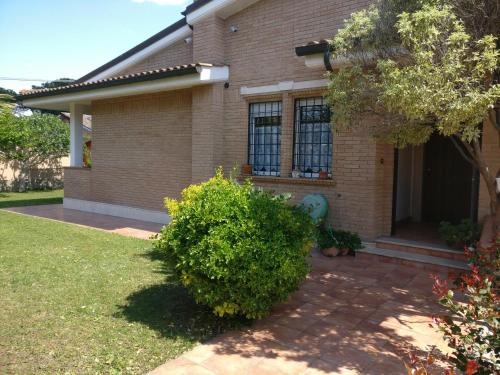 Zona XXX Castel Fusano Apartment | Mattoni Nel Verde