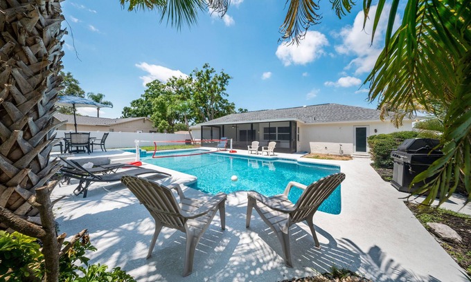 Lake Magdalene House | Mediterranean Oasis! Pool, Game Room & Lounging