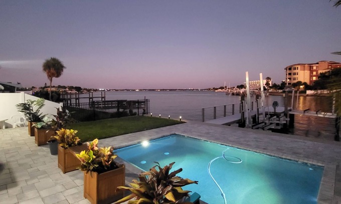 Treasure Island Villa | Million Dollar Views! Waterfront 2 bedroom/2 bath duplex with pool and dock.