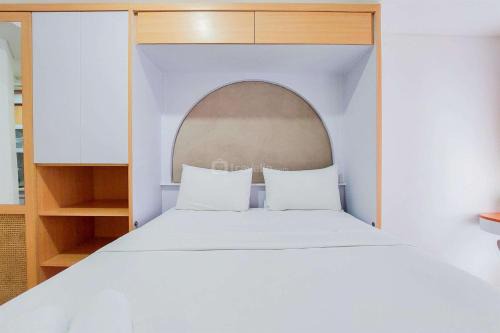 Pinang Apartment | Minimalist Studio Room near Campus at Pacific Garden Alam Sutera Apartment By Travelio