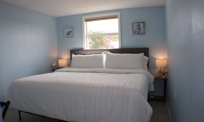 Clearwater House | Minutes to the beach : Private guest house, King bed