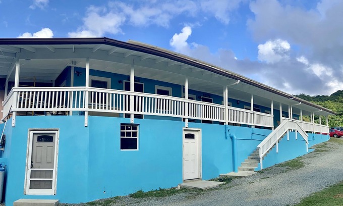 Cane Bay Cottage | Minutes Walk to Cane Bay Beach- Porch Mountain Views, Sea from the backyard