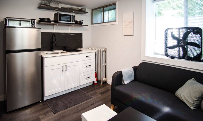 Riverview Apartment | Modern 1 bed basement unit for traveling professionals with garage and laundryn