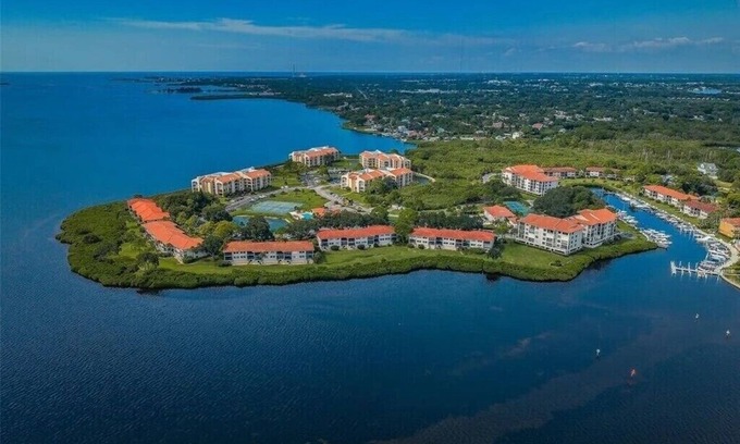 Tarpon Springs Condo | Modern 2 Bedroom Condo in Prime Gulf-Front Community with Pool, Wifi, AC & More