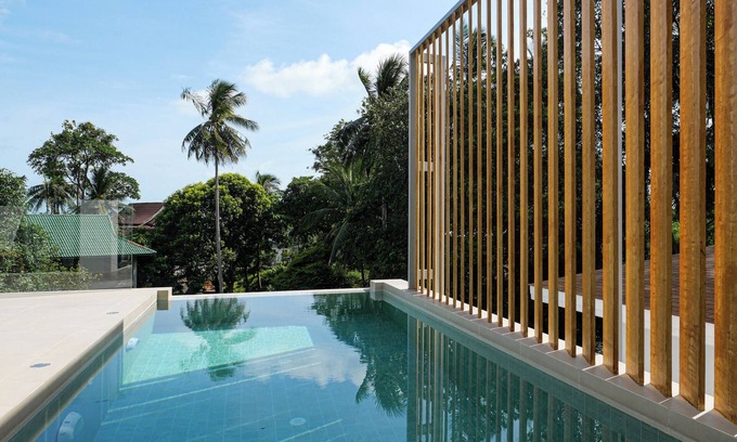 Maret Villa | Modern 2-bedroom villa with private pool, office space, and lush surroundings