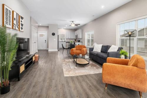 Grandville Apartment | Modern 4BR 4BA Two Unit Condo w Garage and Patio