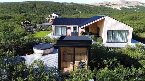 Husafell Ski Chalet | Modern and family friendly Chalet with Ouside Spa - Birta Rentals