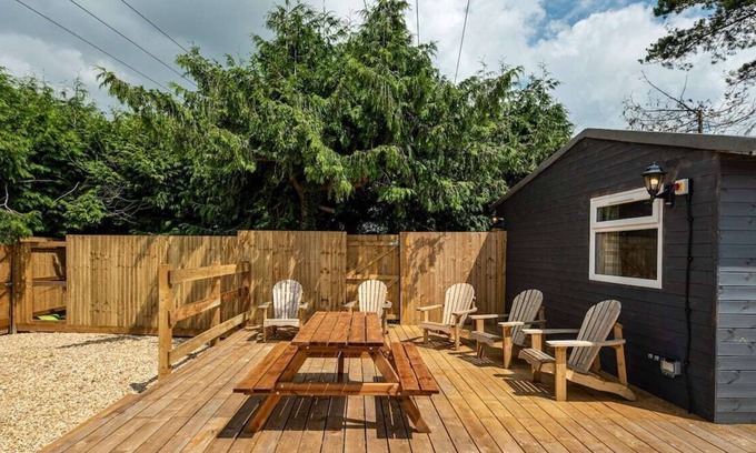 Upton Cheyney Cabin | Modern cabins with gorgeous lounge & sunny deck sleeps 18