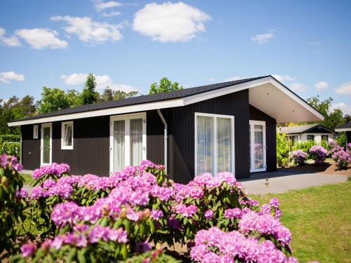 Municipality of Veldhoven Ski Chalet | Modern chalet on the water in the Brabant Kempen