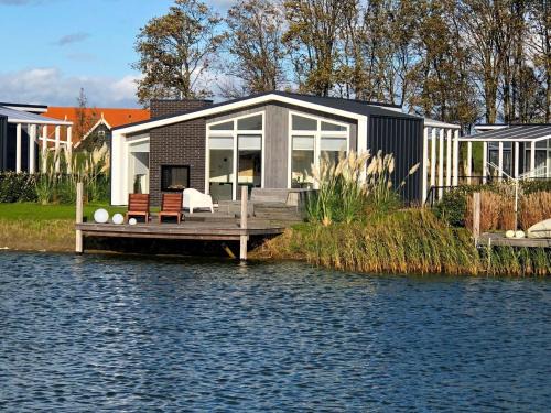 Wemeldinge House | Modern chalet with jetty and terrace