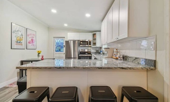 Pinellas Park House | Modern Chic Bungalow + Pool House Outdoor Shower