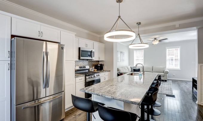 Lancaster House | Modern City Home w/Private Patio! Walkable to Markets, Coffee Shops & More!