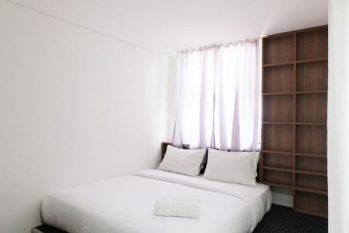 Serpong Apartment | Modern City View Studio Apartment at Tuscany Residences By Travelio