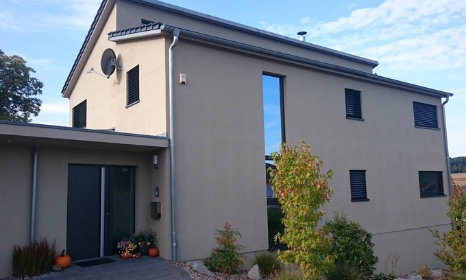 Wollbach Apartment | Modern & comfortable vacation apartment with own entrance, large balcony. Terrace & own PP