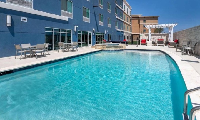 San Angelo House | Modern Convenience! 4 Relaxing Units! Onsite Pool, FREE Breakfast, Parking!