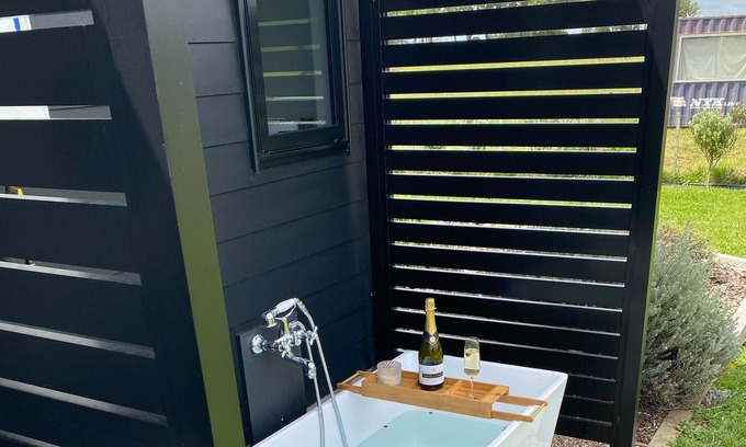Raglan House | Modern, cozy, Beachy Bach with beautiful rural views in Raglan