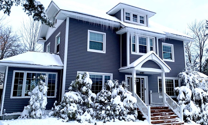 Hillcrest House | Modern Family Retreat, Steps to Mirror Lake/Main St, Hot Tub, Game Room, Deck