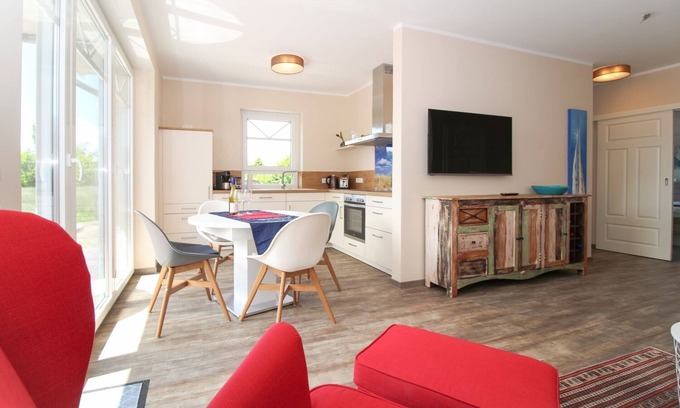 Norden Apartment | Modern first floor apartment with sauna and beach chair in the garden for 4 persons