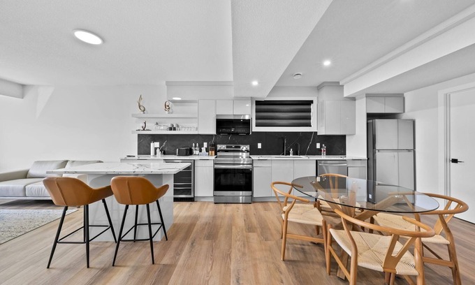Leduc County House | Modern home-style space close to airport.