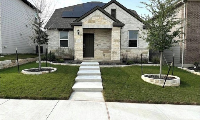 Hutto House | Modern Hutto Home with Theater Room