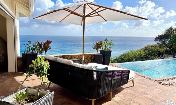 Falmouth Harbour House | Modern, luxury family home overlooking Falmouth Harbour and surrounding ocean.