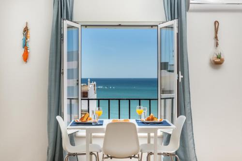 Cavacos Apartment | Modern ocean view apt 2 min walk to beach