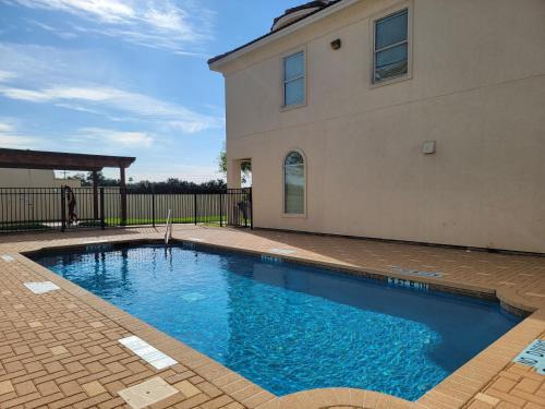 McAllen Apartment | Modern, Private, Smart 4 BR Condo in Desirable Location in McAllen with Pool!