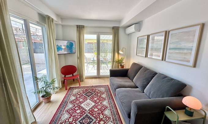 Olymbiaki Akti Apartment | Modern Seaside Home with Private Patio + Parking - Blue Zone Homes