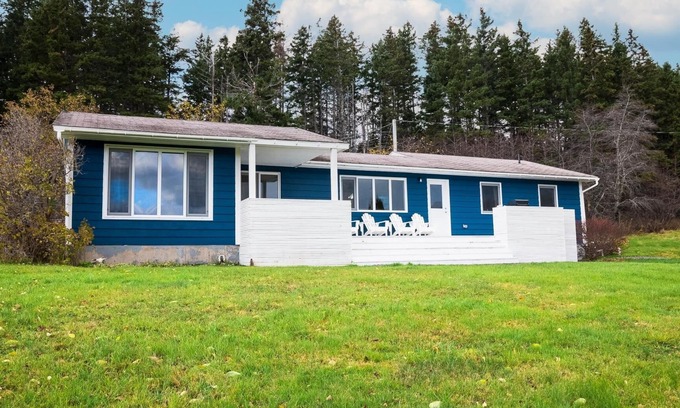 Margaree Forks House | Modern style home with spectacular views of the Margaree River.