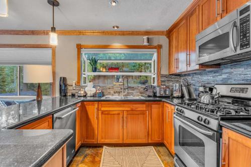 Timberland House | Modern Tahoe Retreat with Grill Walk to Beach