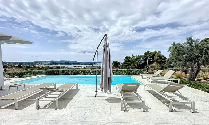 Agii Anargiri Villa | Modern villa with pool and stunning sea views