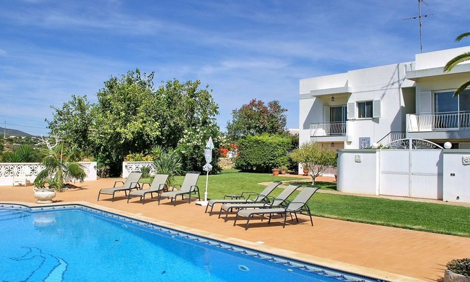 Quelfes House | Modern Villa with Pool, Garden and BBQ in an orange grove, near Olhão, Portugal