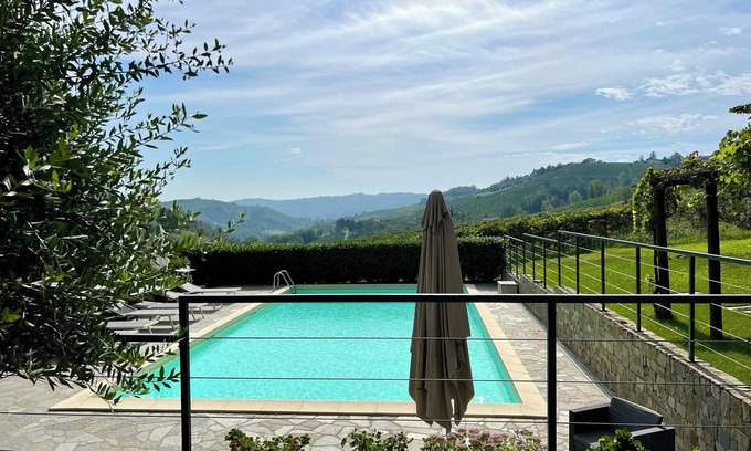 San Bovo Villa | Modern villa with private pool and panoramic vineyard views in Piemonte.