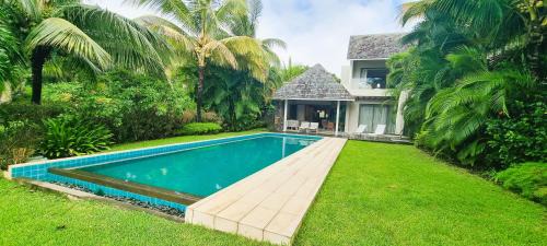 Grand River South East Villa | Modern Villa with Private Pool at Anahita Golf Resort
