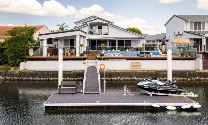 Runaway Bay House | Modern Waterfront Retreat| Private Pool & Dock
